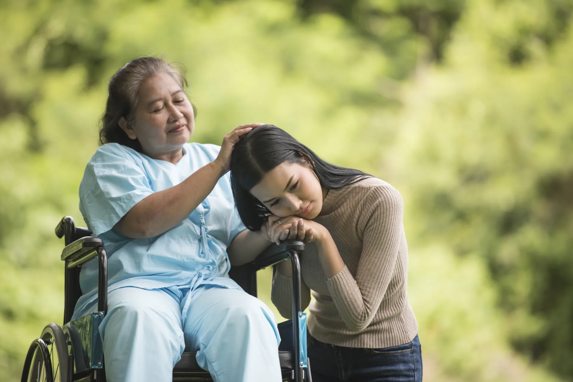 Granddaughter supporting grandmother in wheelchair — stroke recovery care at NeuroMet Wellness Gurgaon